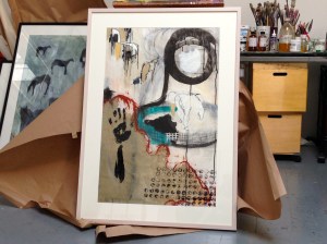 Preparing paintings for display. Image and paintings by jparadisi 2014